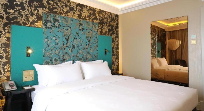 Jinjiang Metropolo Xujiahui Nanhuating Hotel 4*